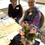Karen Flann and Joyce Moncrieff staff the registration table